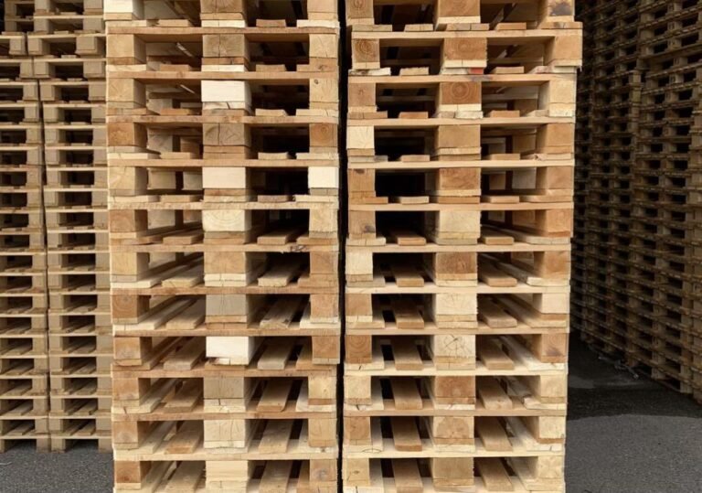 Stacks of wooden pallets ready for delivery